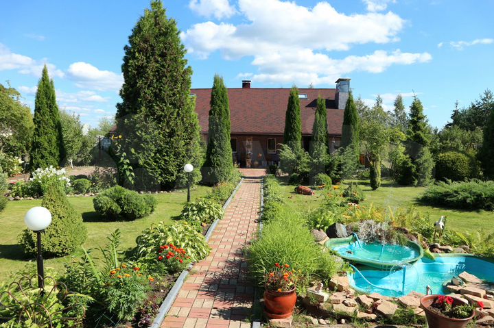 Коттедж 570 м² на участке 41 сот.