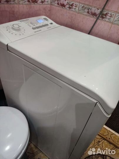 Стиральная машина с вертикальной загрузкой