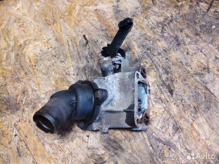Корпус термостата Renault Logan 2