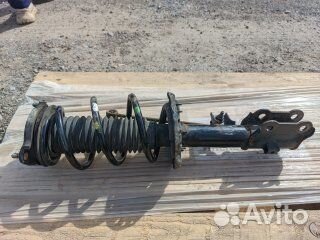 Kia Sportage 4 стойка амортизатора в сборе