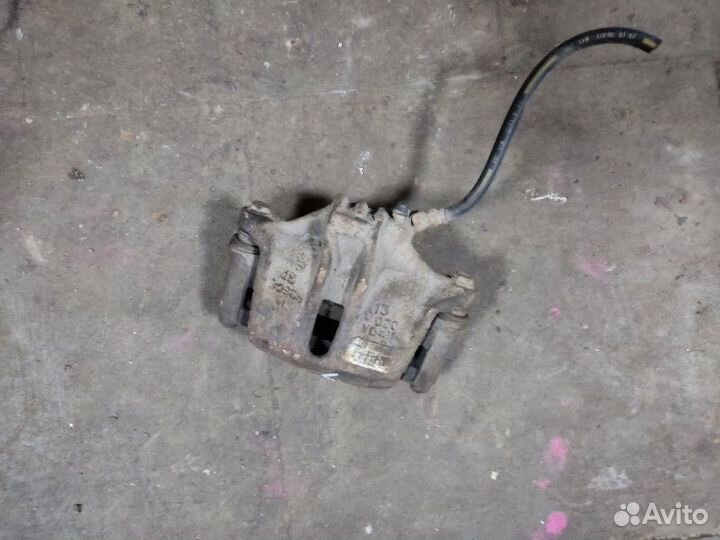 Суппорт тормозной передний левый Peugeot 206