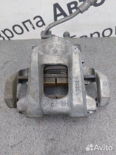 Суппорт задний левый Jeep Grand Cherokee WK2 3.0D