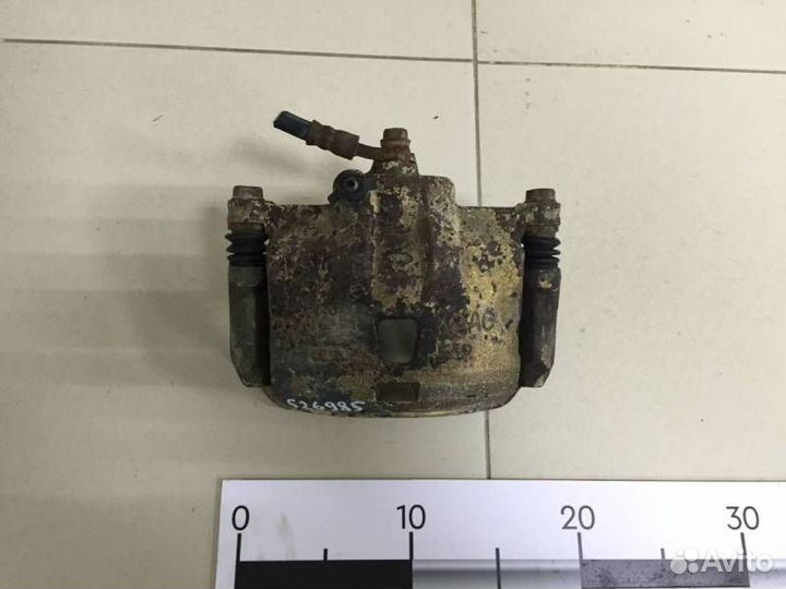 Суппорт передний правый Nissan Almera Classic B10