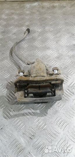 Суппорт тормозной задний левый Ssangyong Actyon