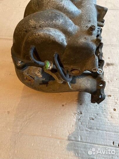 Коллектор впускной Mazda 323