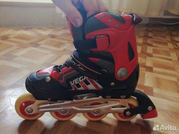 Роликовые коньки