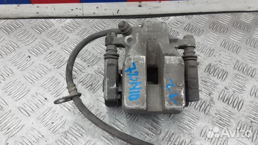 Суппорт тормозной задний левый toyota camry V50 (7