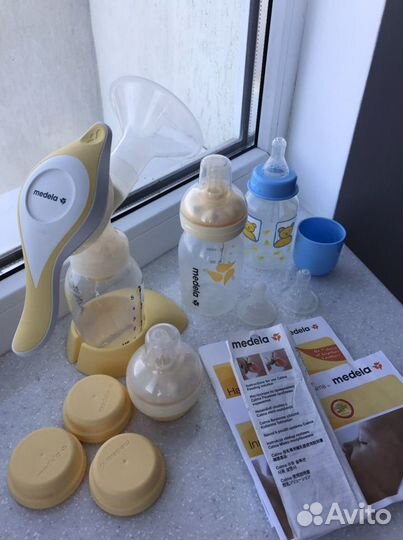 Молокоотсос medela harmony