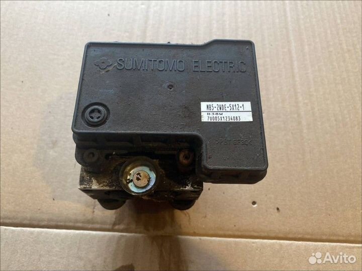 Блок ABS (насос) Mitsubishi Lancer