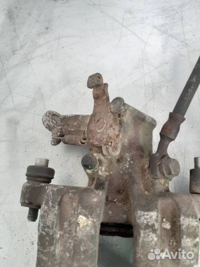 Суппорт тормозной задний Suzuki Swift 2 рест. 1999