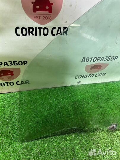 Стекло двери переднее левое Nissan Terrano D10