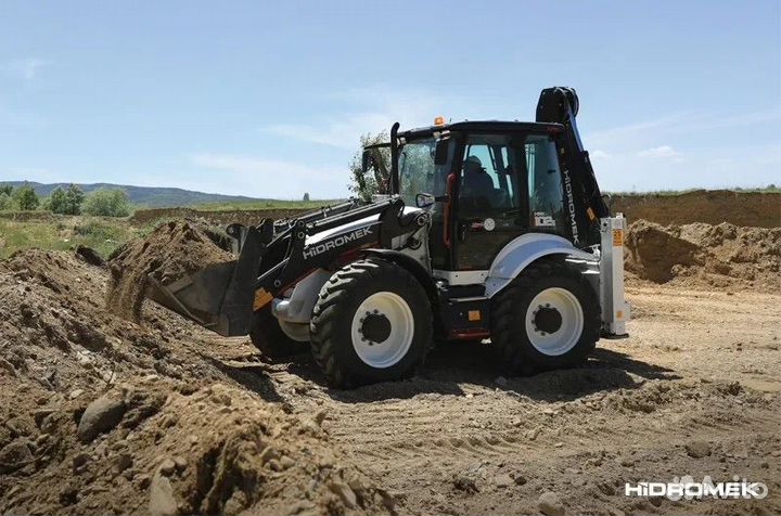 Машинист экскаватора погрузчика hidromek 102s