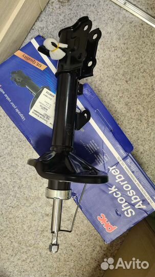 Задний правый амортизатор на Hyundai Coupe/Tuscani