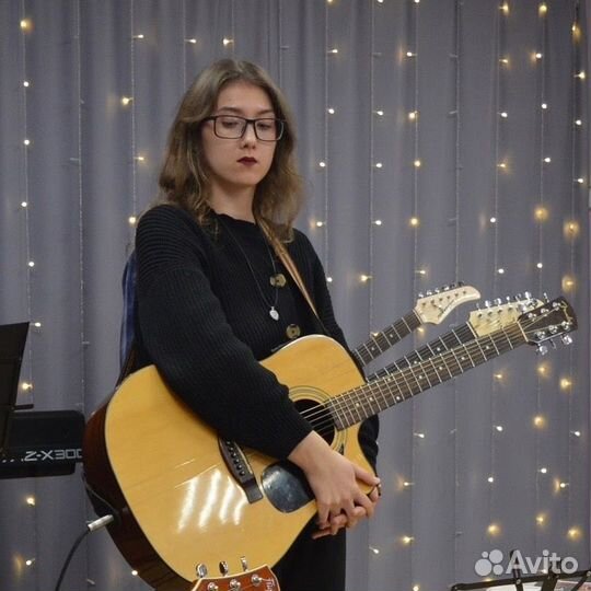 Учитель гитары и укулеле