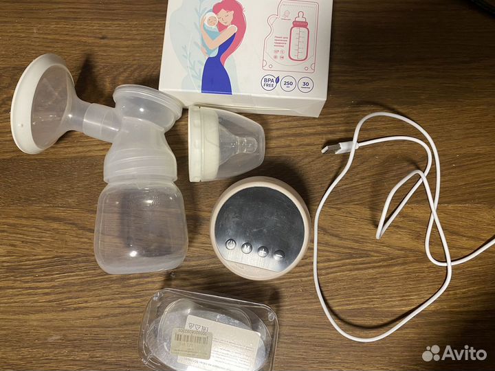 Электронный молокоотсос