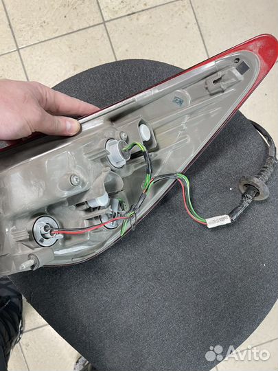 Фонарь левый внешний Nissan Almera G15