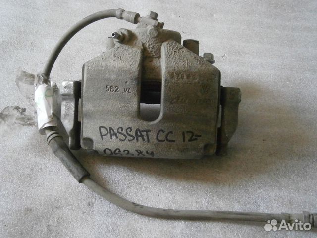 Суппорт передний правый Volkswagen Passat CC