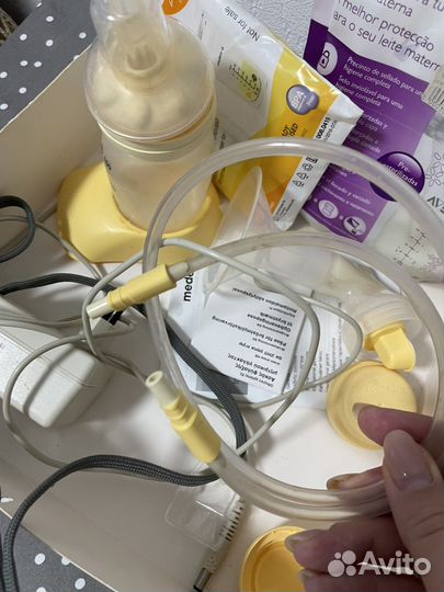 Молокоотсос medela электрический