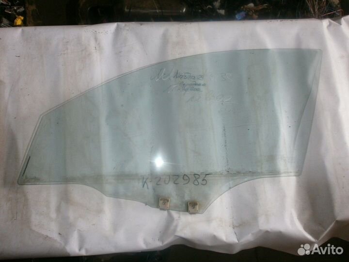 Стекло двери передней левой (Mazda 3)