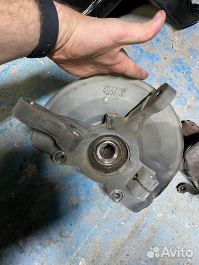 Mitsubishi lancer 10 кулак поворотный