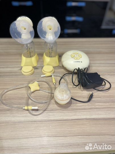 Молокоотсос medela swing электрический