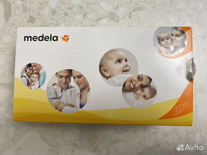 Молокоотсос medela ручной