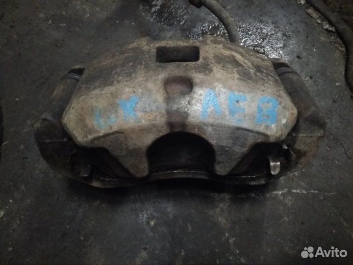 Суппорт передний левый Mitsubishi Lancer 10