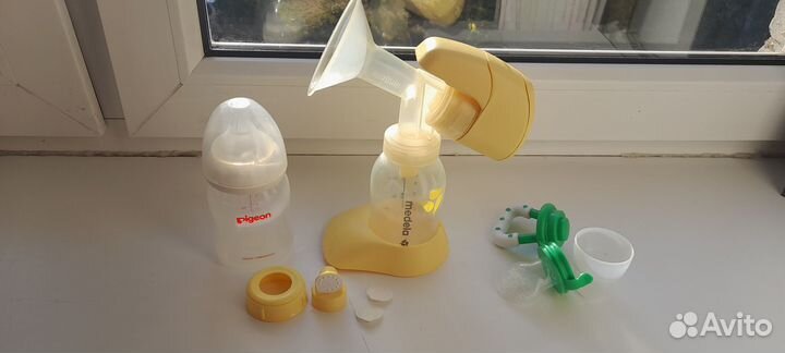 Электрический молокоотсос Medela