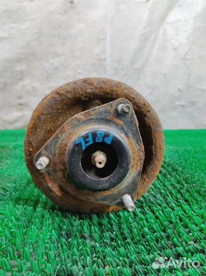 Стойка амортизатора передняя левая Mitsubishi Lan