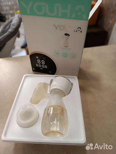 Молокоотсос электрический новый