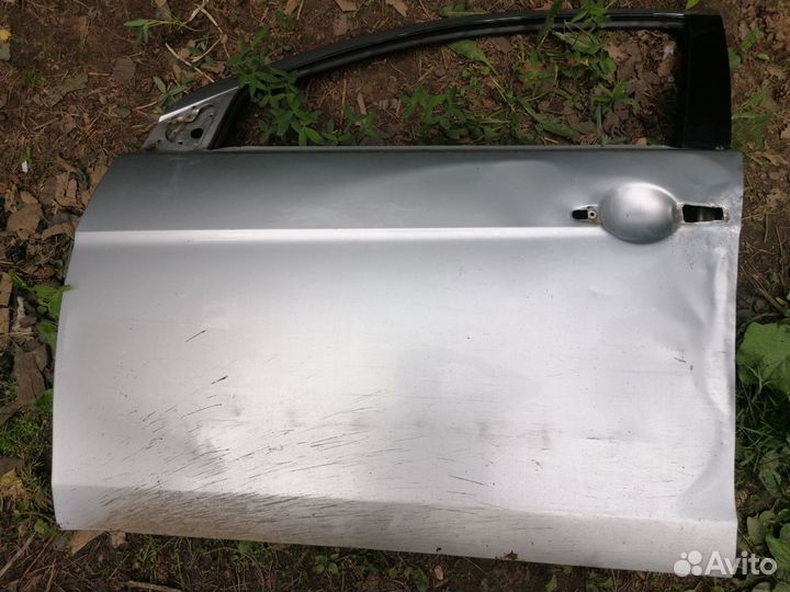 Дверь передняя левая lancer 10 a 31