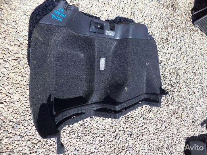 Обшивка багажника левая Toyota Corolla Fielder