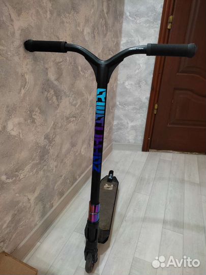 Трюковой самокат reaction