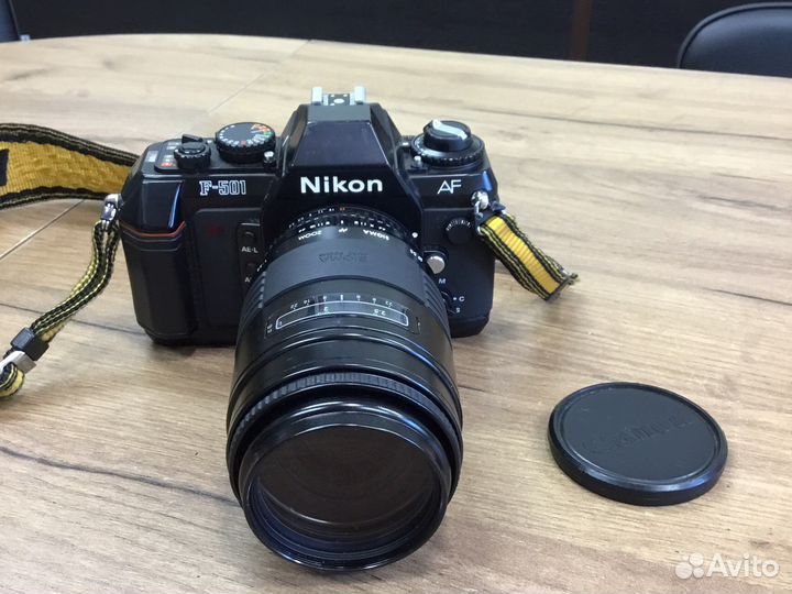 Nikon F-501+Sigma AF zoom 1:3,8 f75-200mm