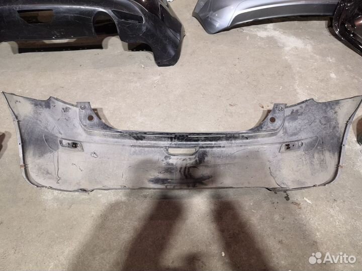 Бампер задний Ниссан Нота бу