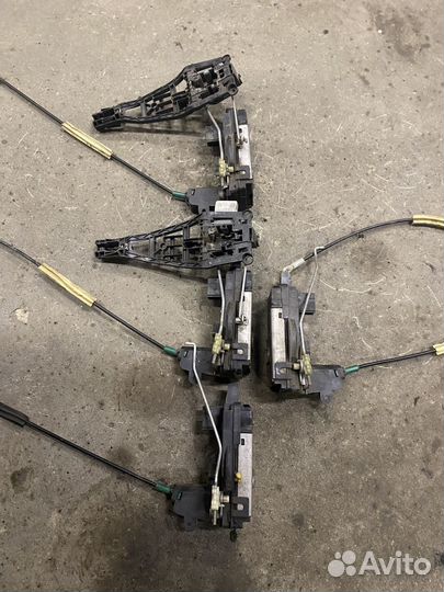 Замок двери передний левый Opel Astra H