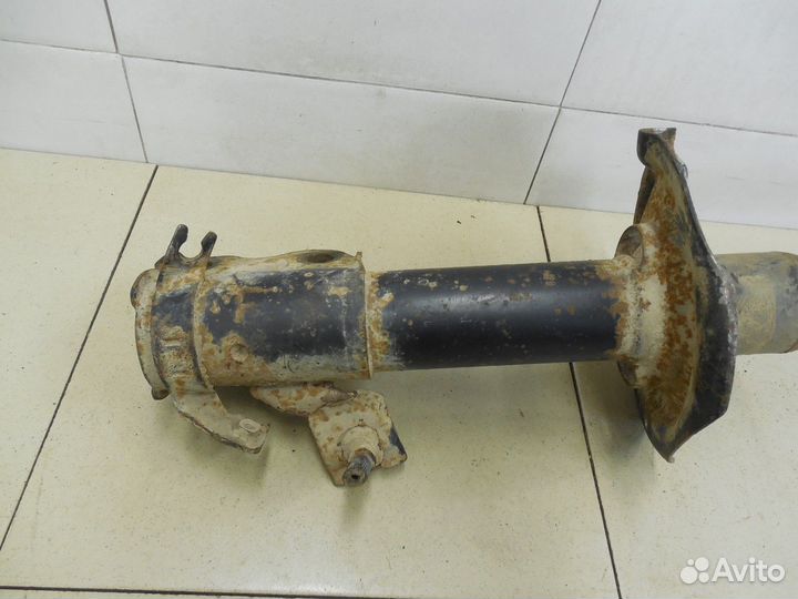 Амортизатор передний левый Almera Tino 2000-2006