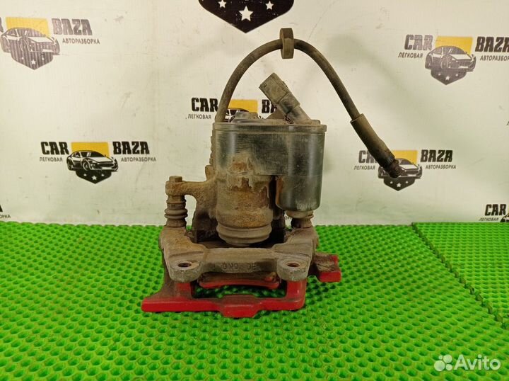 Суппорт тормозной задний левый L Audi A6