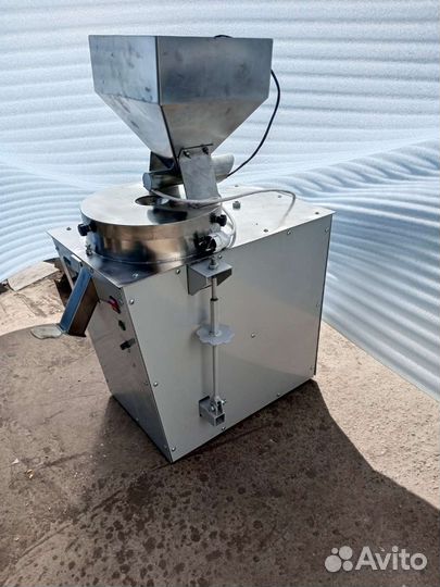 Мельница на каменных жерновах