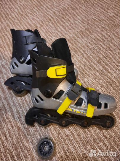 Роликовые коньки