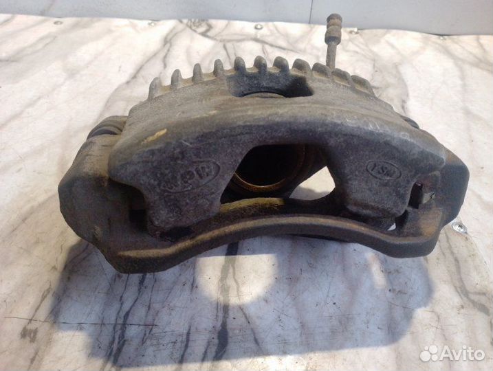 Суппорт тормозной передний правый Kia Sportage FE