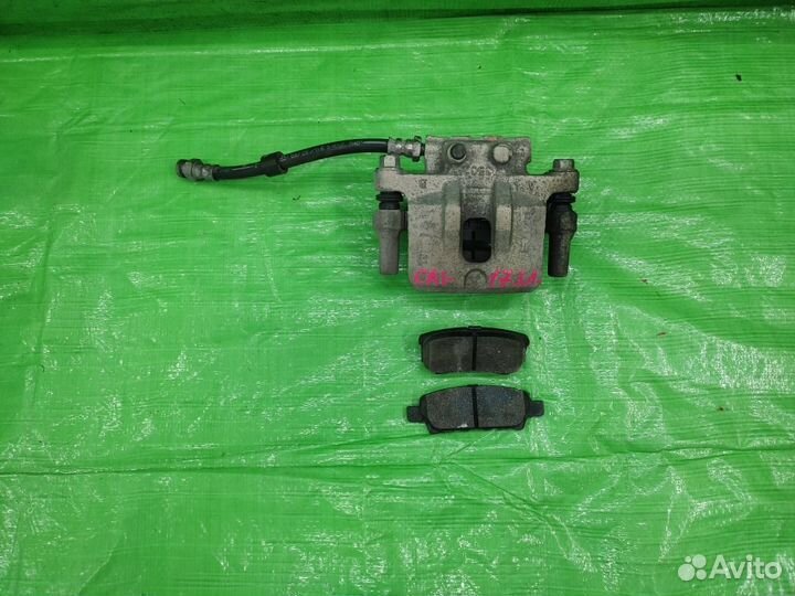 Суппорт зад. лев + колодки Caliber/Compass/Patriot