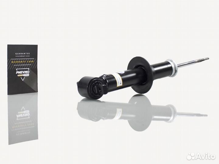 Амортизатор Cadillac Escalade передний под пружину