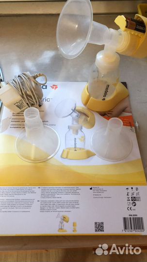 Молокоотсос medela электрический
