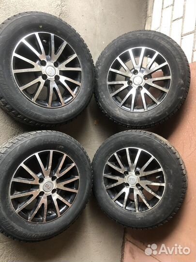 R14 Bridgestone Blizzak WS-60 185/70, PCD 4x100 DIA 56.1