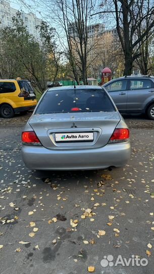 Mitsubishi Lancer 1.6 AT, 2009, 260 000 км