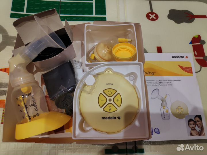 Молокоотсос medela swing электрический