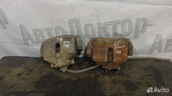 Суппорт передний правый Volkswagen Passat B6