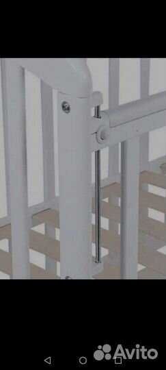 Детская кроватка с маятником и ящиком