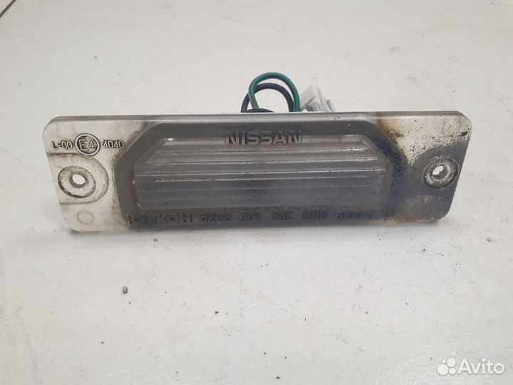 Фонарь подсветки номера Nissan Almera